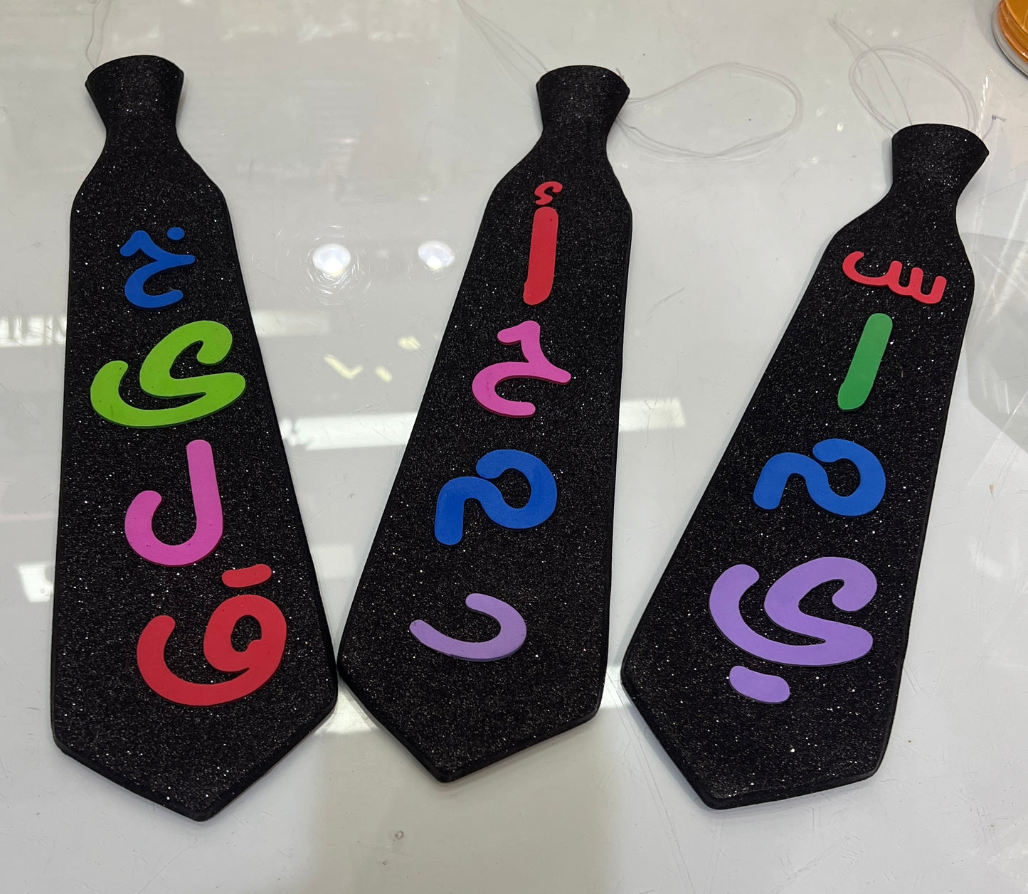 Tie PVC -اليوم العالمي للغة العربية